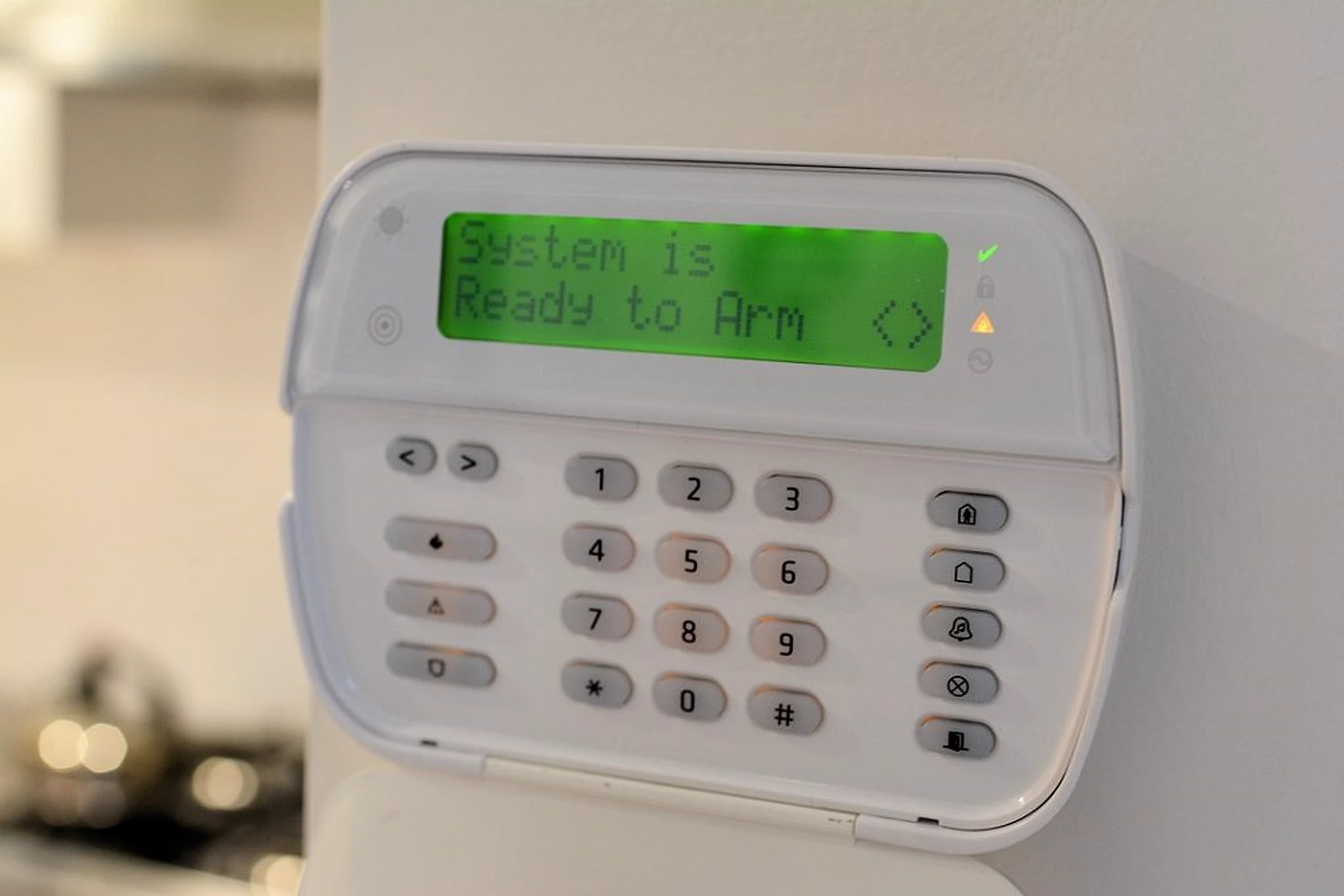 DSC alarm system keypad displaying System is Ready to Arm